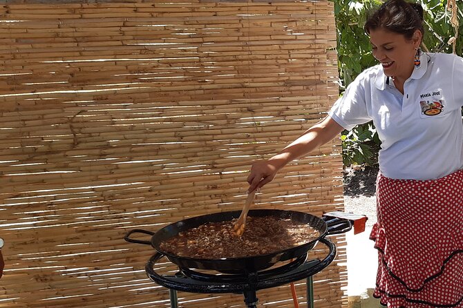 Chefcooking Paella from our Andalusian Grandmother at a Family Farm - Who will enjoy this afternoon most
