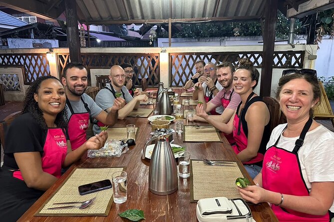 Cooking Class with Organic Farm in Chiang Mai - Picking herbs on a 1.6-acre organic farm
