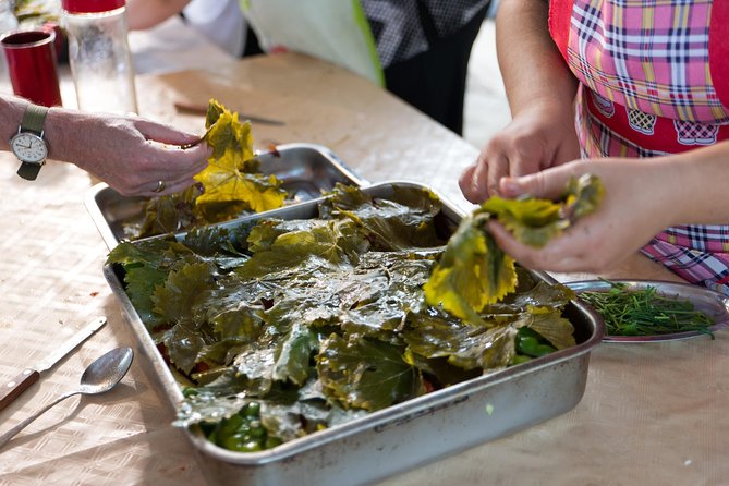 Cretan Cooking Class at a Farm with Hotel Pickup and Drop-Off - Sitting down to a homemade Cretan dinner