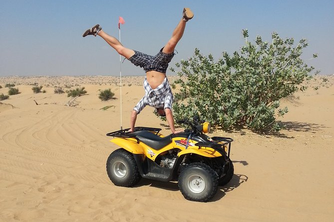 Dubai Desert Morning Tour in 4WD Vehicle: Camel Ride, Quad Bike Tour, Sandboarding, and Camel Farm - The camel ride is traditional, but brief