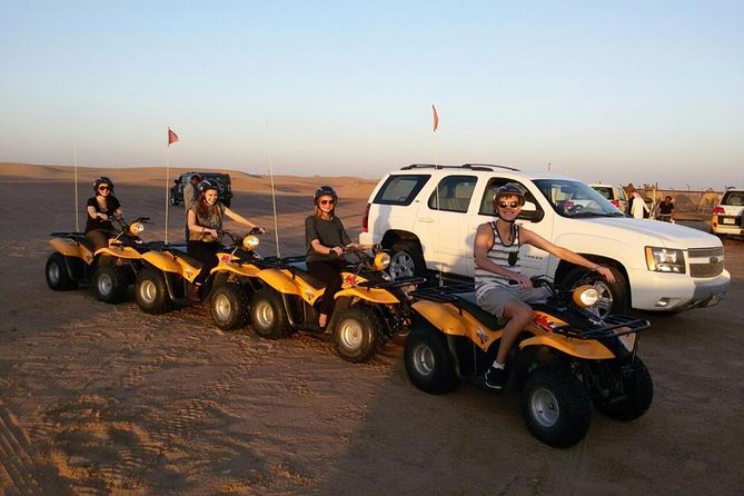 Dubai Desert Morning Tour in 4WD Vehicle: Camel Ride, Quad Bike Tour, Sandboarding, and Camel Farm - Group size, pace, and the four-hour limit