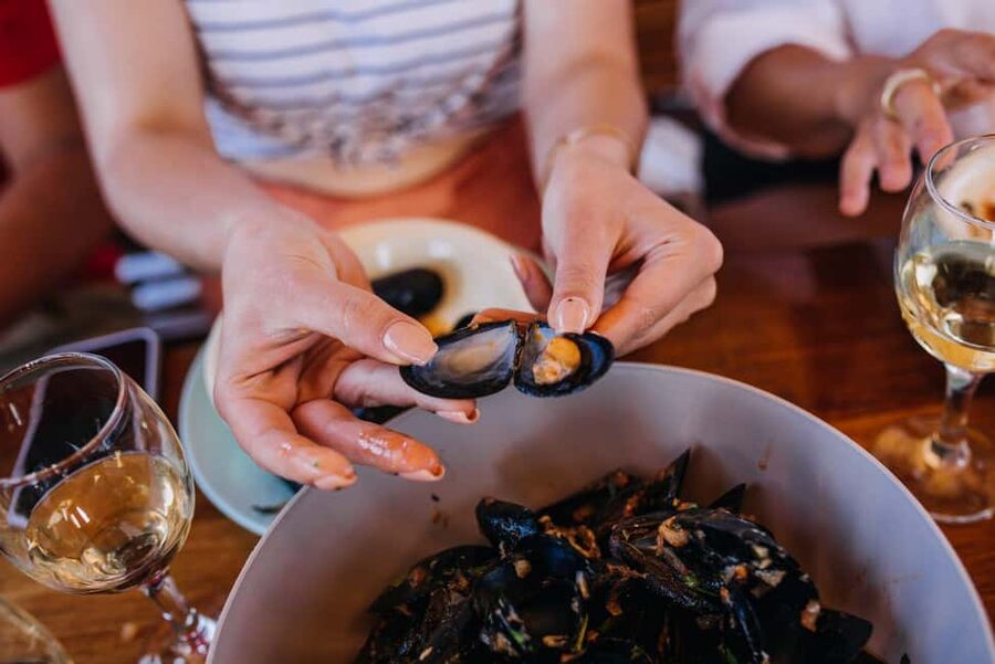 From Dubrovnik: Mali Ston Oysters Farm & Boat Experience - A traditional boat over Ston Bay