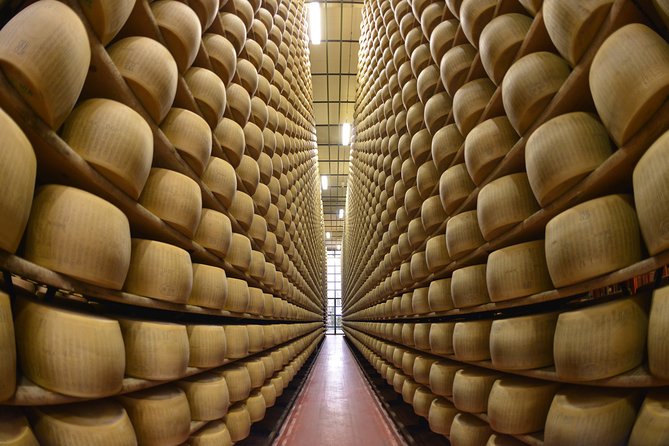 From Parma: Parmigiano Reggiano Farm Tour & Tasting with Transfer - The essentials at a glance