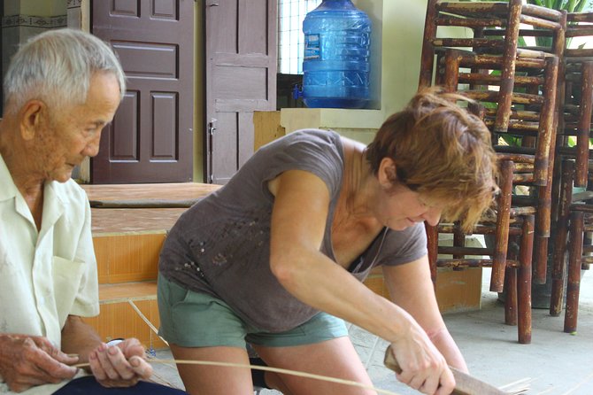 Half Day Ride Bike To The Farm and Cooking Activity with Foot Massage - Working in the herb garden with a local family