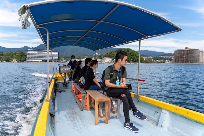 Miyajima Guided Tour and Fresh Oyster Farm Tour - One hour on Omotesando Shopping Street