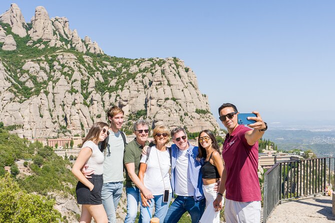 Montserrat Full Day Tour with Farmhouse Lunch and Winery Visit - The cogwheel train down the mountain