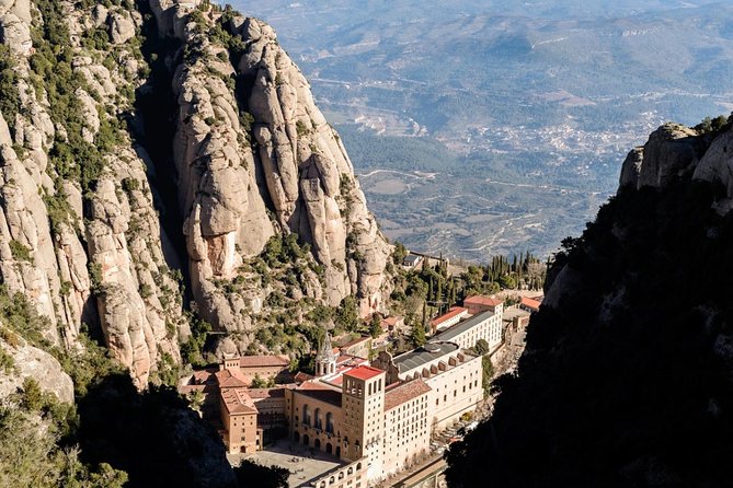Montserrat Lunch & Wine at Farmhouse Small Group from Barcelona - Arriving at Montserrat and the Benedictine monastery