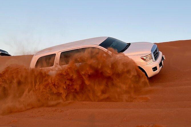 "Morning Desert Safari with Camel Farm visits & Arabic Treats" - Holding on during 30 minutes of dune bashing