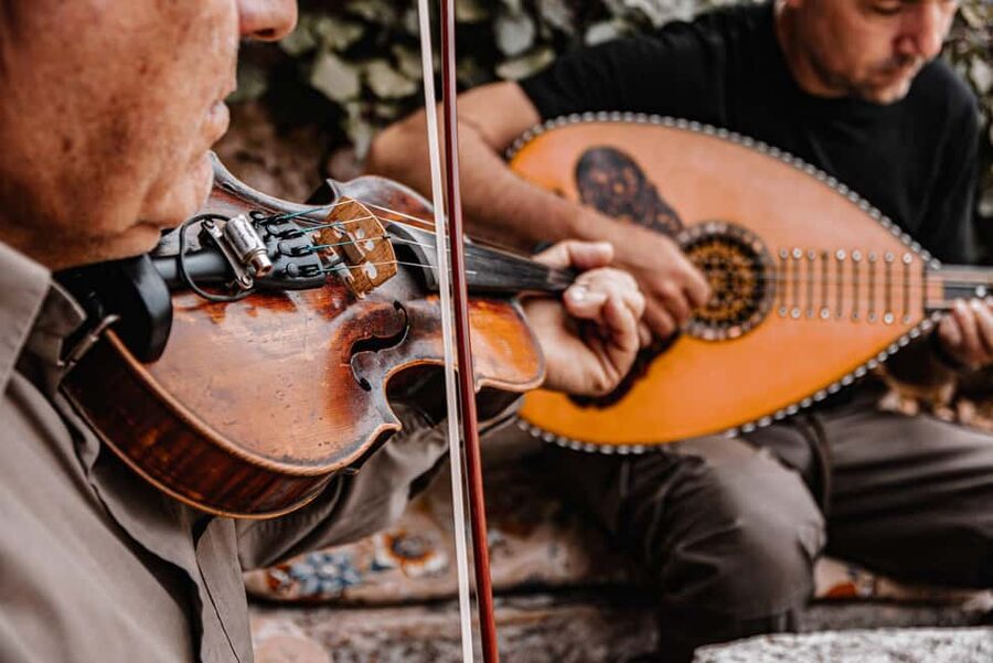 Naxos: Family Farm-table Cooking, Kouros Tour & Live Music - Cooking over wood fire and open flame