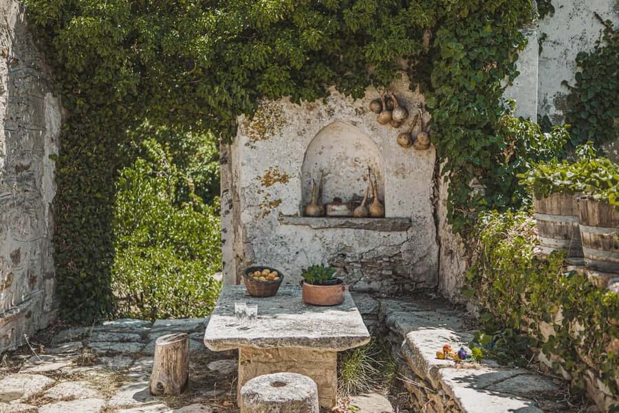 Naxos: Family Farm-table Cooking, Kouros Tour & Live Music - Walking through the spring-fed garden