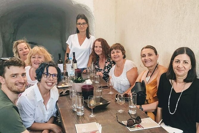 Santorini Family Farm Food & Wine Tour with Cooking Class - Santorini wine, volcanic soil, and four local pours