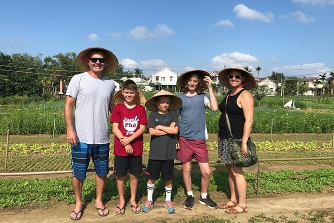 Small Group Bicycle Tour with Farming and Fishing Experience - Palm-thatched homes and a fisherman’s family