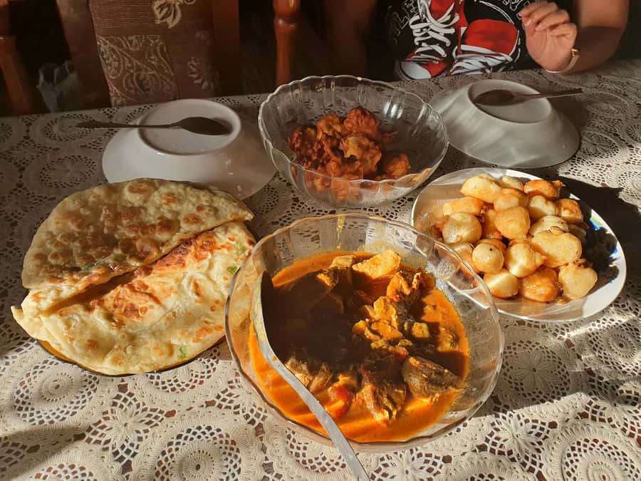 Zanzibar: Walking Spice Farm with Local Cooking Class - A cooking hut with simple tools and strong flavors